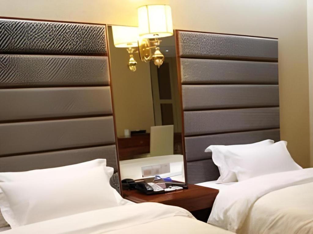 Milu Hotel Гуанчжоу Экстерьер фото